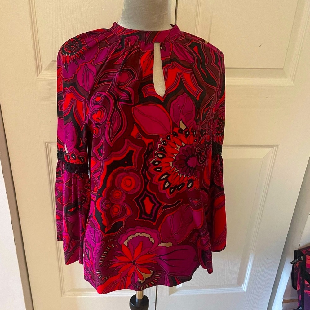 Valentine Red silk blouse with bell sleeves and open work lace detail.